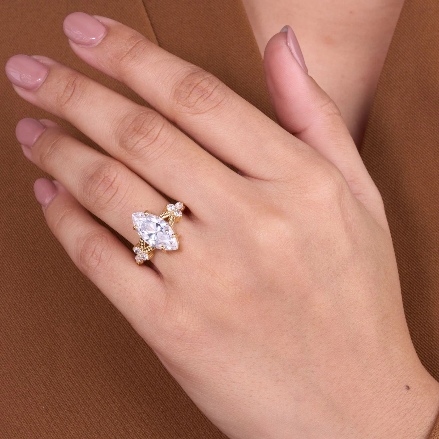 vintage lab grown marquise cut diamond ring with elegant floral inspired detailing and timeless sparkling statement design