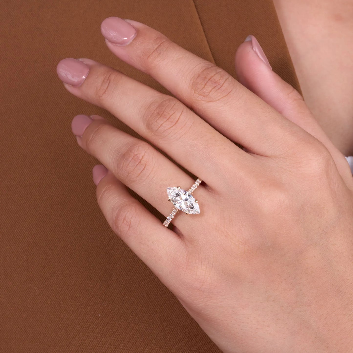 elegant marquise cut solitaire lab grown diamond engagement ring with sparkling pavé diamond band for timeless luxury and bridal beauty