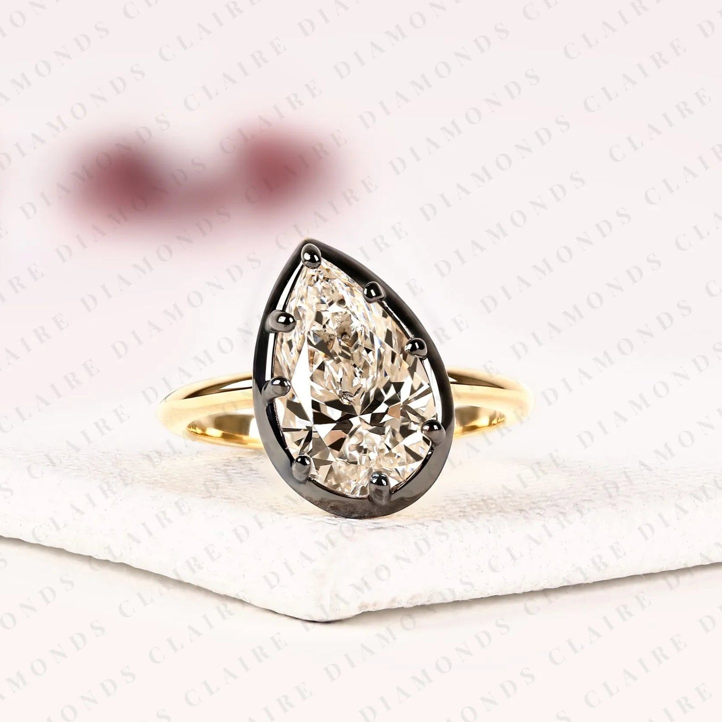 pear shape lab grown diamond solitaire ring | black bezel two-tone gold contemporary setting