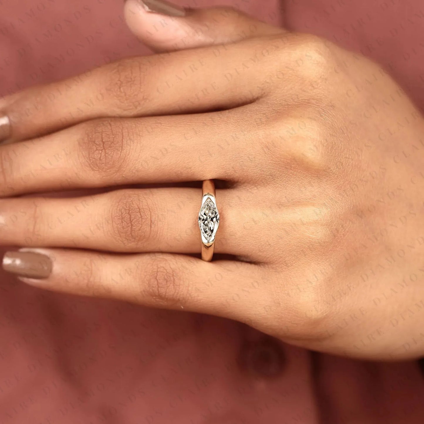 minimalist marquise cut solitaire lab grown diamond engagement ring in yellow gold | modern bezel-inspired promise ring for women.