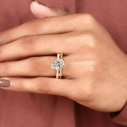 Luxury Pear Cut Moissanite Diamond Engagement Ring with Pavé Diamond Accents and Bamboo Inspired Matching Wedding Band Set