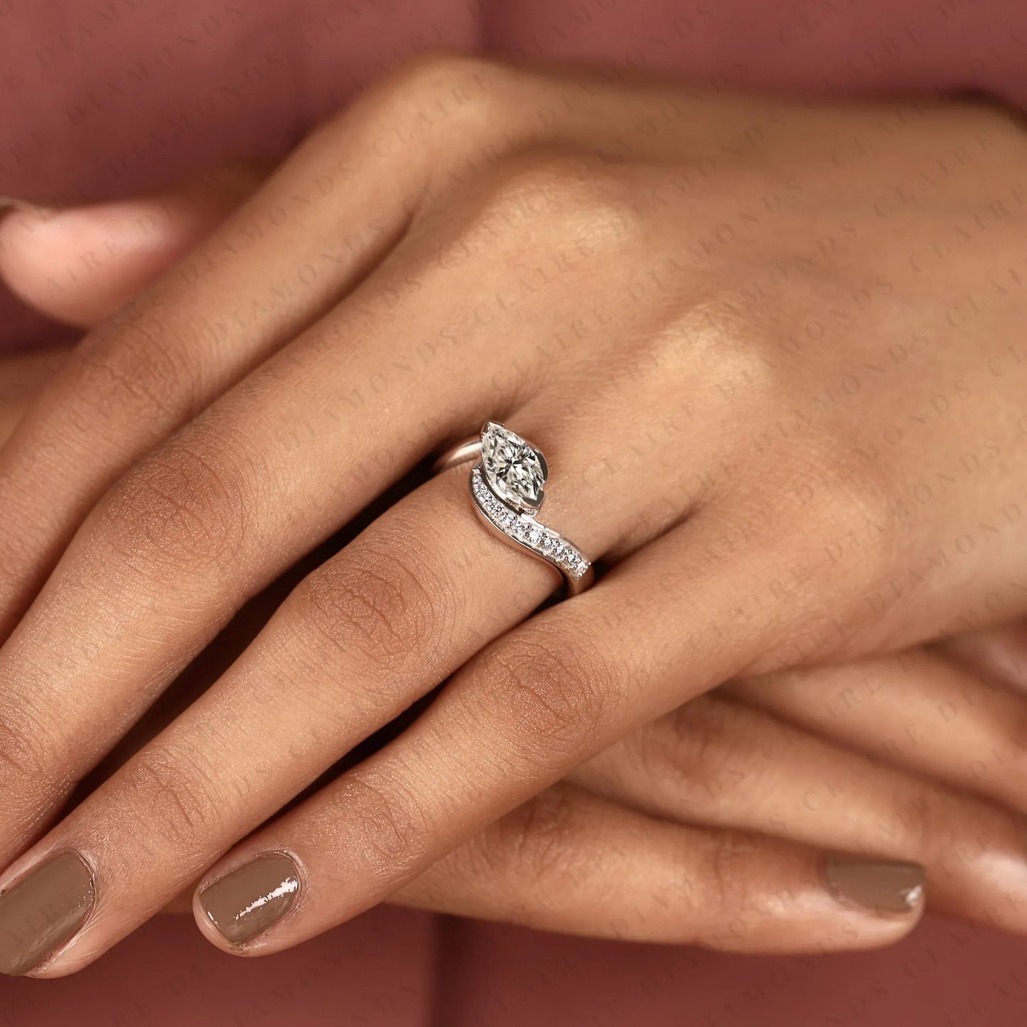 marquise cut lab grown diamond east west bypass engagement ring in gold with round side stones , modern bridal jewelry.