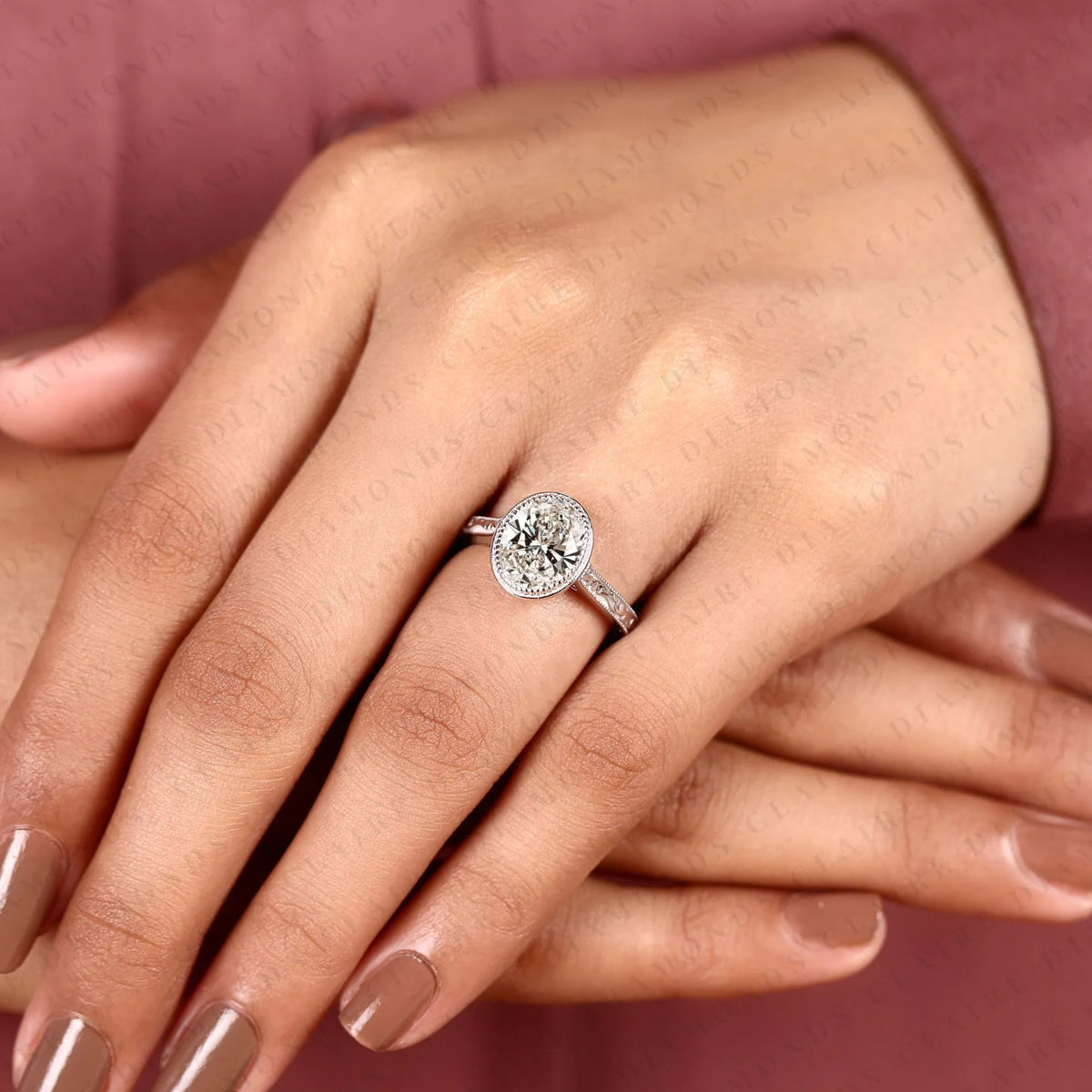 oval cut lab grown diamond engagement ring vintage milgrain bezel setting white gold engraved band elegant solitaire bridal jewelry