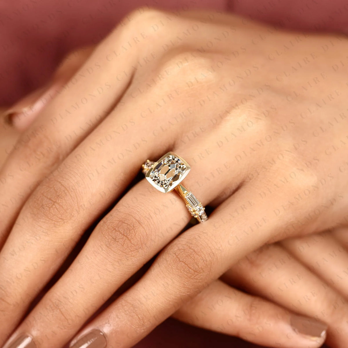 old mine elongated cushion cut lab grown diamond engagement ring yellow gold bezel ring with baguette side stone modern luxury bridal jewelry