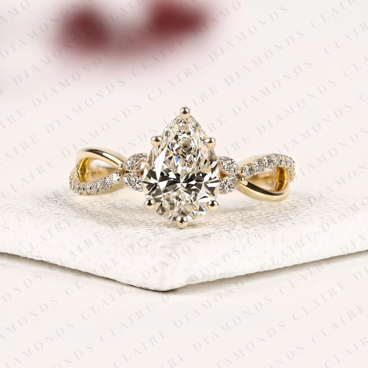 pear cut lab grown diamond engagement ring | yellow gold twisted vine pavé band | nature inspired bridal ring | elegant unique wedding jewelry