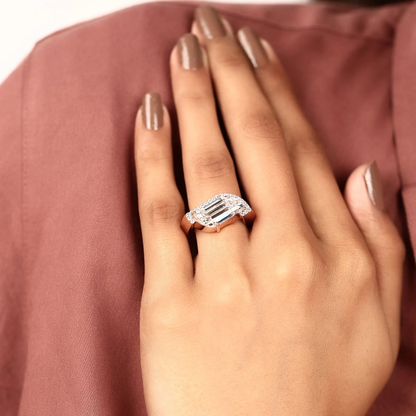 modern flame cut moissanite diamond halo engagement ring with exceptional brilliance