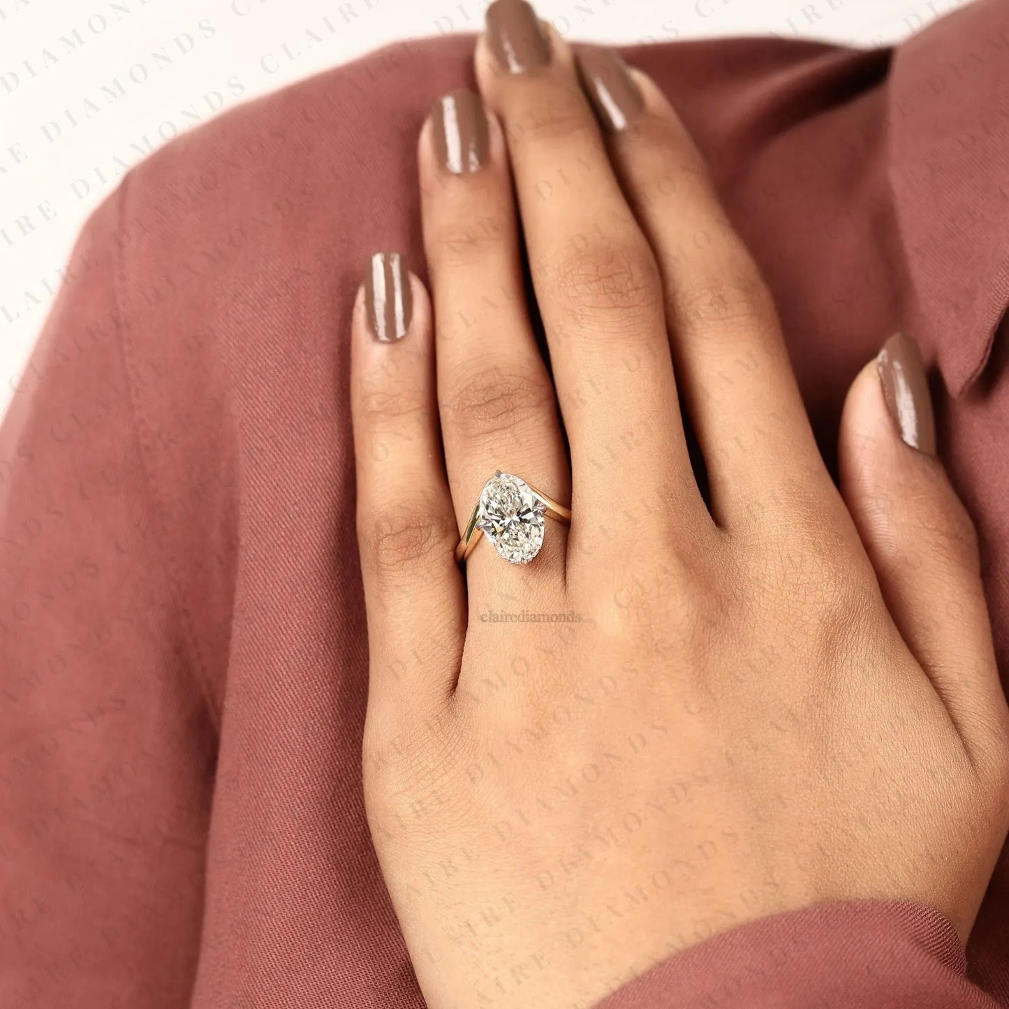 oval cut solitaire lab grown diamonds two tone engagement ring with sculpted gold band – modern elegance redefined