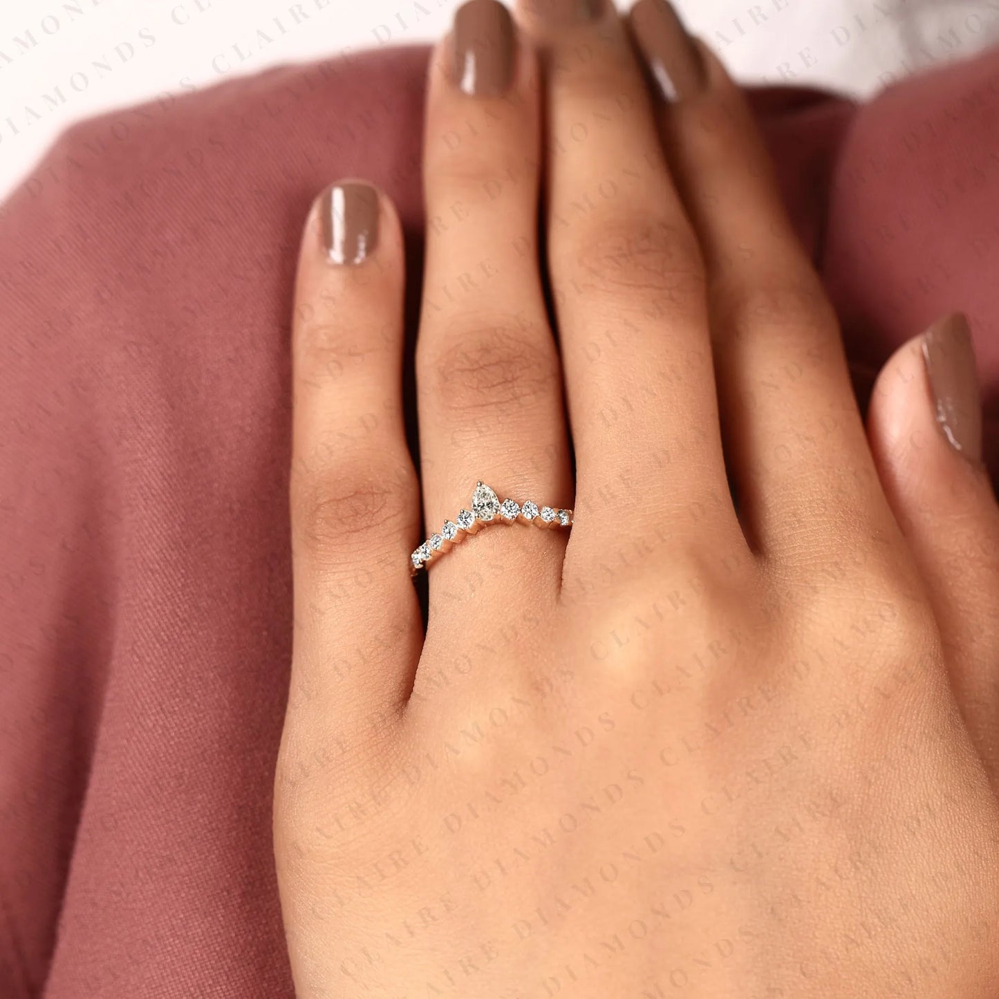 0.64 tcw classic pear cut lab grown diamond anniversary ring with delicate round brilliant diamonds and everyday sparkle