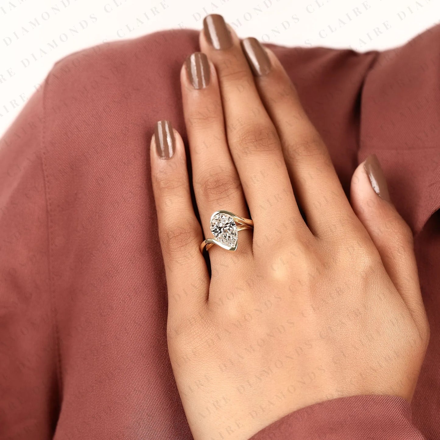 pear shape lab grown diamond hidden halo solitaire ring with contemporary twist setting