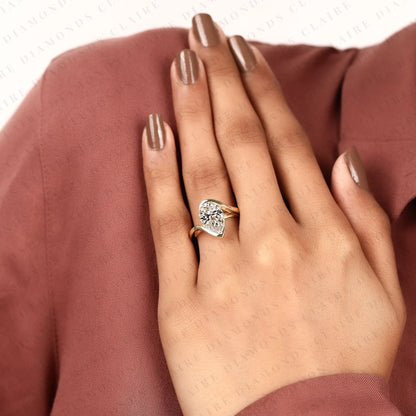 Pear Shape Lab Grown Diamond Hidden Halo Solitaire Ring with Contemporary Twist Setting