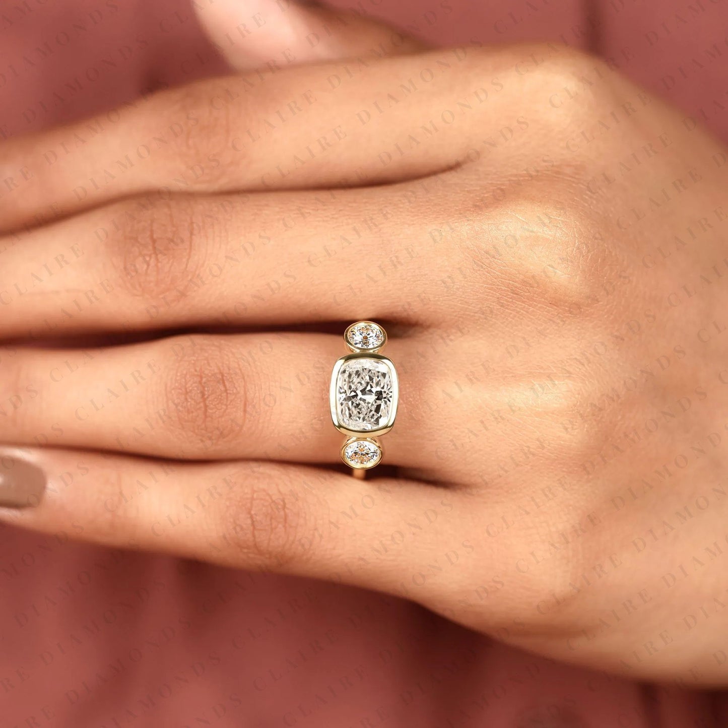 elongated cushion cut bezel set three stone lab grown diamond engagement ring modern gold ring minimalist bridal jewelry.