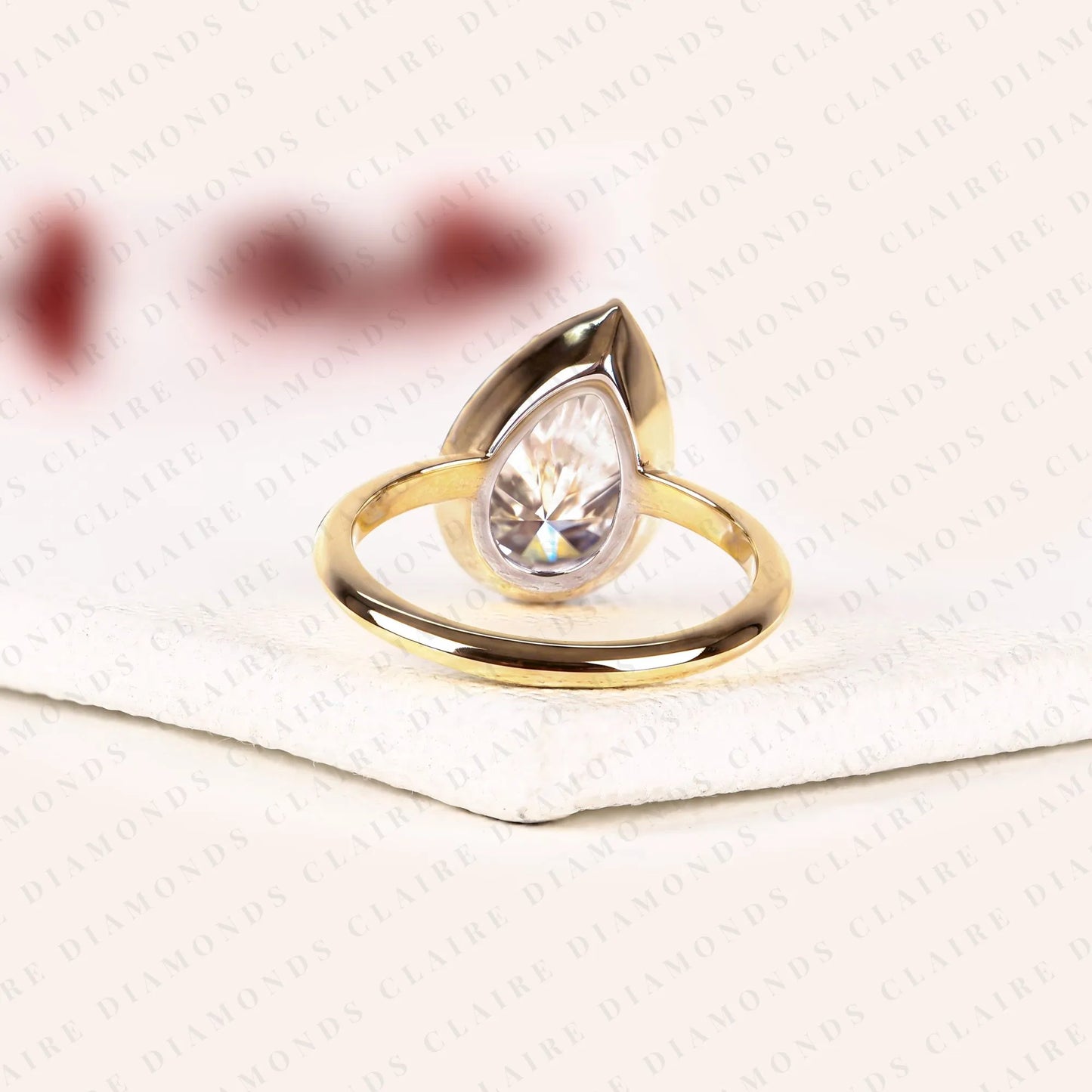 pear shape lab grown diamond solitaire ring | black bezel two-tone gold contemporary setting