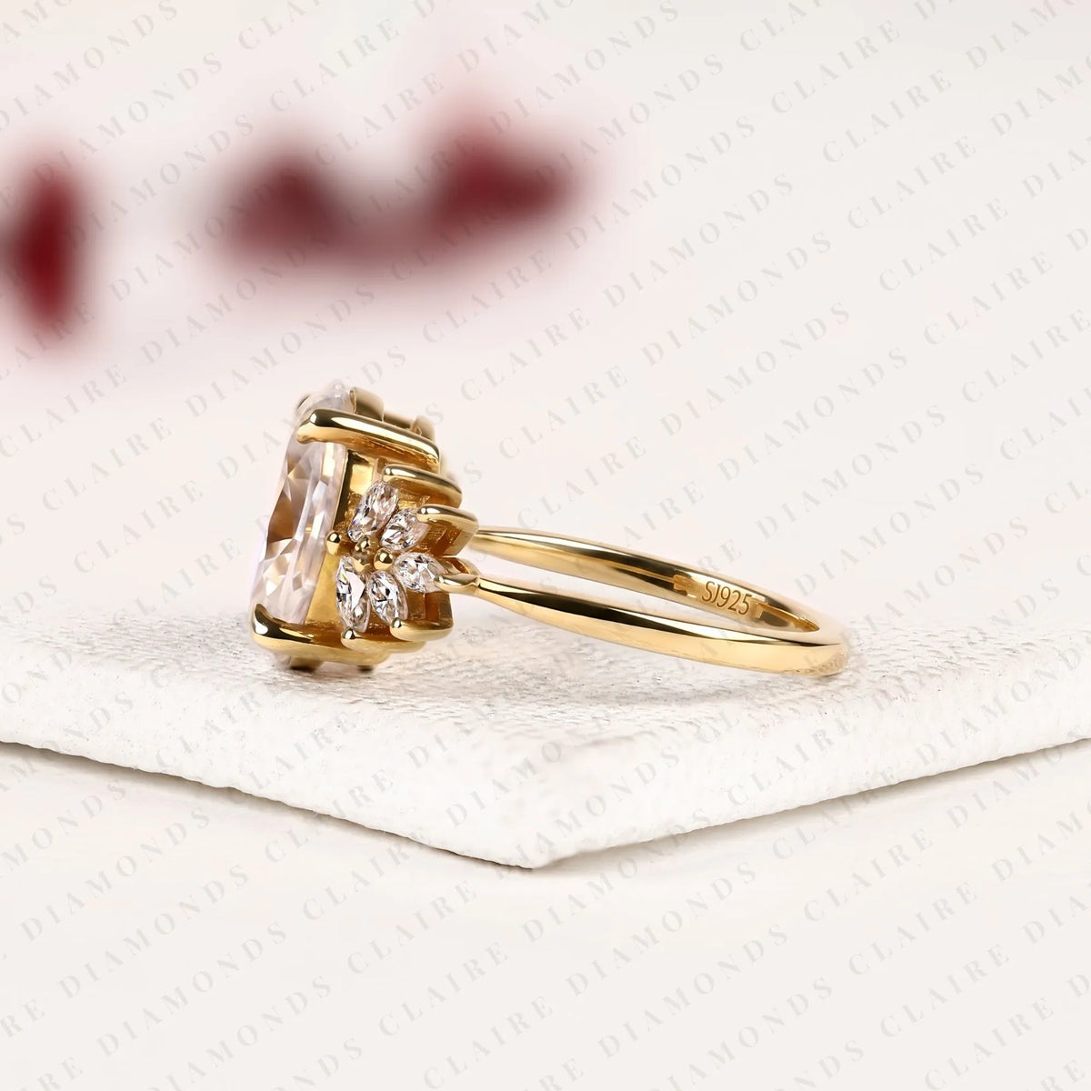 oval cut lab grown diamond engagement ring | floral cluster side stone ring | yellow gold nature inspired bridal jewelry | elegant statement wedding ring