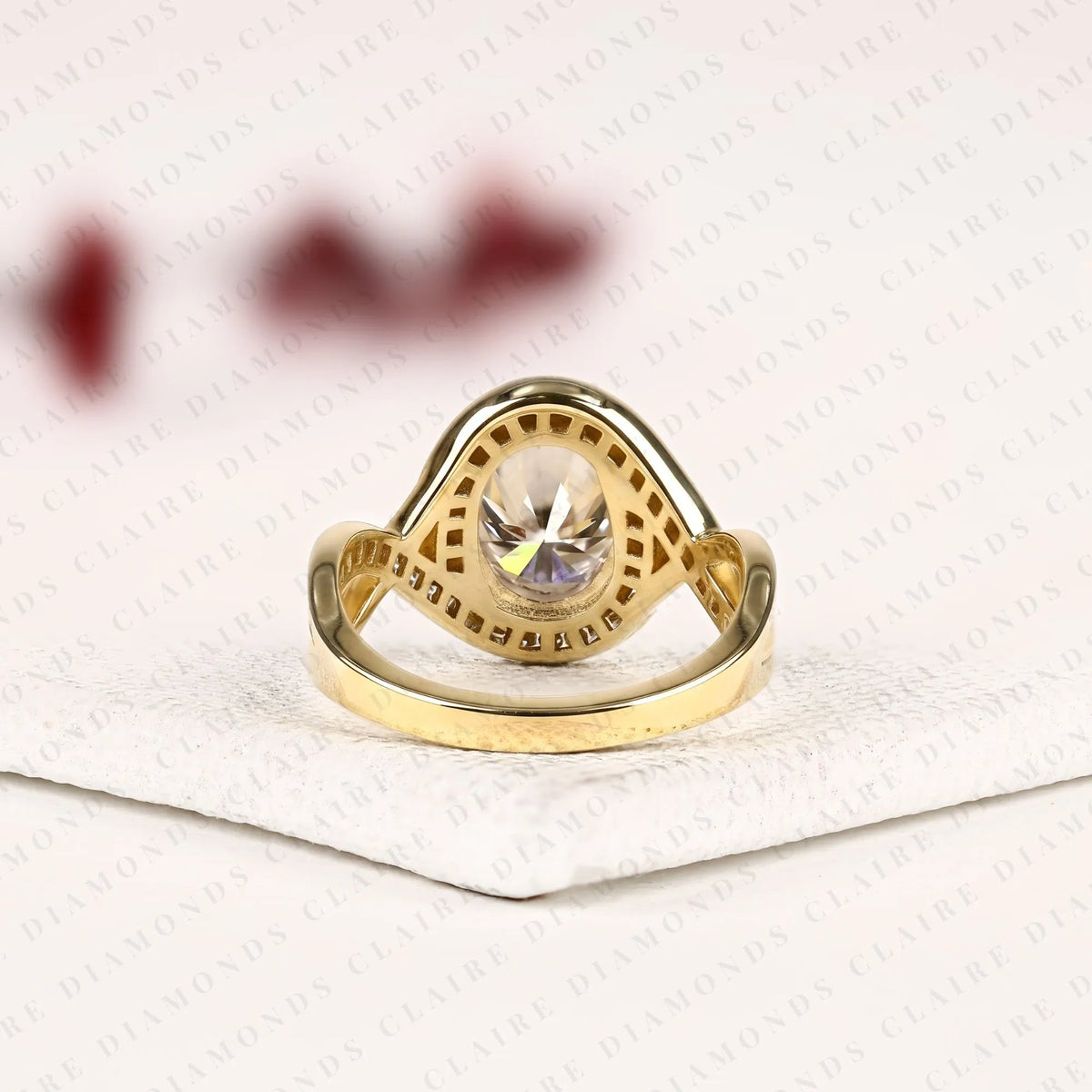 oval cut lab grown diamond engagement ring | pavé bezel halo yellow gold bypass ring | twisted split shank bridal jewelry | modern statement ring