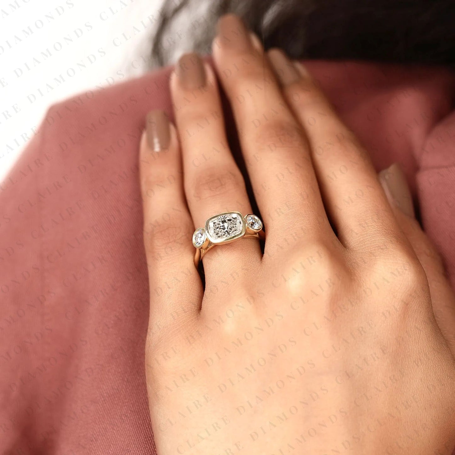 elongated cushion cut bezel set three stone lab grown diamond engagement ring modern gold ring minimalist bridal jewelry.
