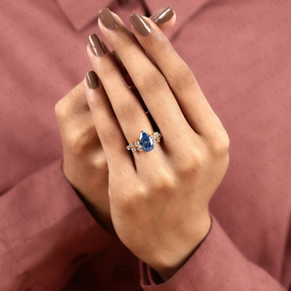 Pear Cut Blue Lab Grown Engagement Ring, Round Diamond Floral Side Stones, Yellow Gold Nature-Inspired Bridal Ring
