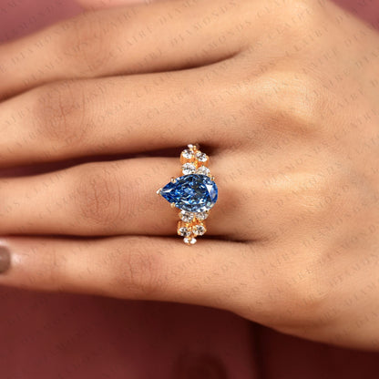 Pear Cut Blue Lab Grown Engagement Ring, Round Diamond Floral Side Stones, Yellow Gold Nature-Inspired Bridal Ring