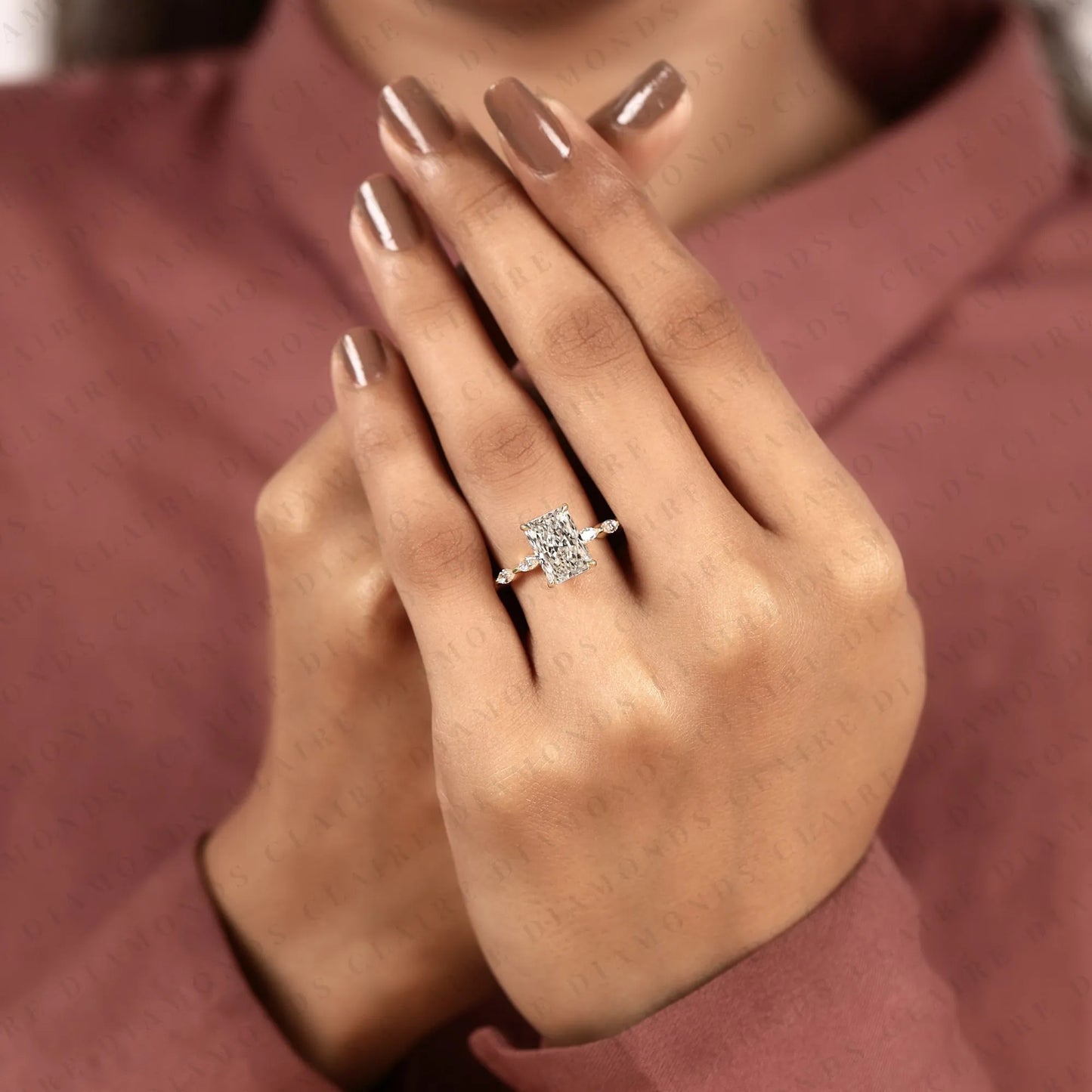 radiant cut lab grown diamond hidden halo engagement ring in yellow gold marquise accent band