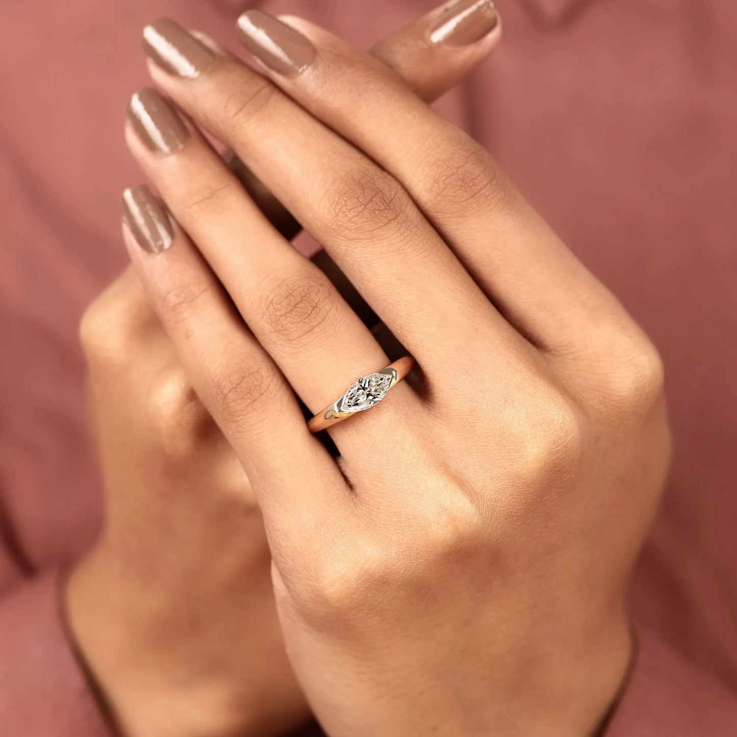 minimalist marquise cut solitaire lab grown diamond engagement ring in yellow gold | modern bezel-inspired promise ring for women.