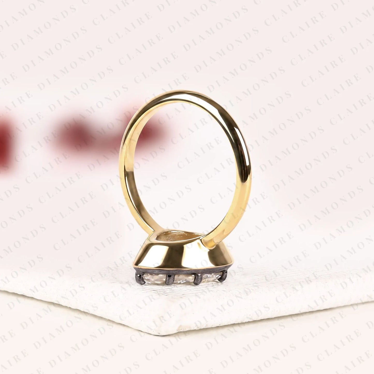pear shape lab grown diamond solitaire ring | black bezel two-tone gold contemporary setting