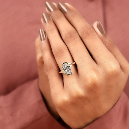 Pear Shape Moissanite Diamond Hidden Halo Solitaire Ring with Contemporary Twist Setting