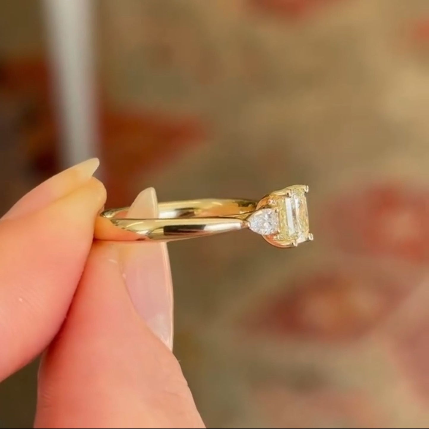 elegant cushion cut moissanite diamond three-stone ring in gold minimalist engagement ring