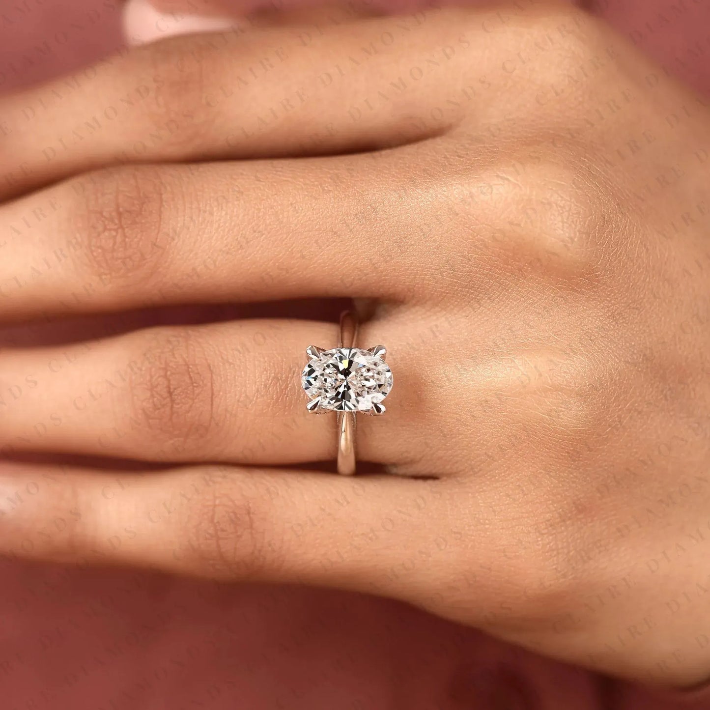 oval cut lab grown diamond solitaire engagement ring, four prong hidden tulip setting, minimalist white gold proposal ring