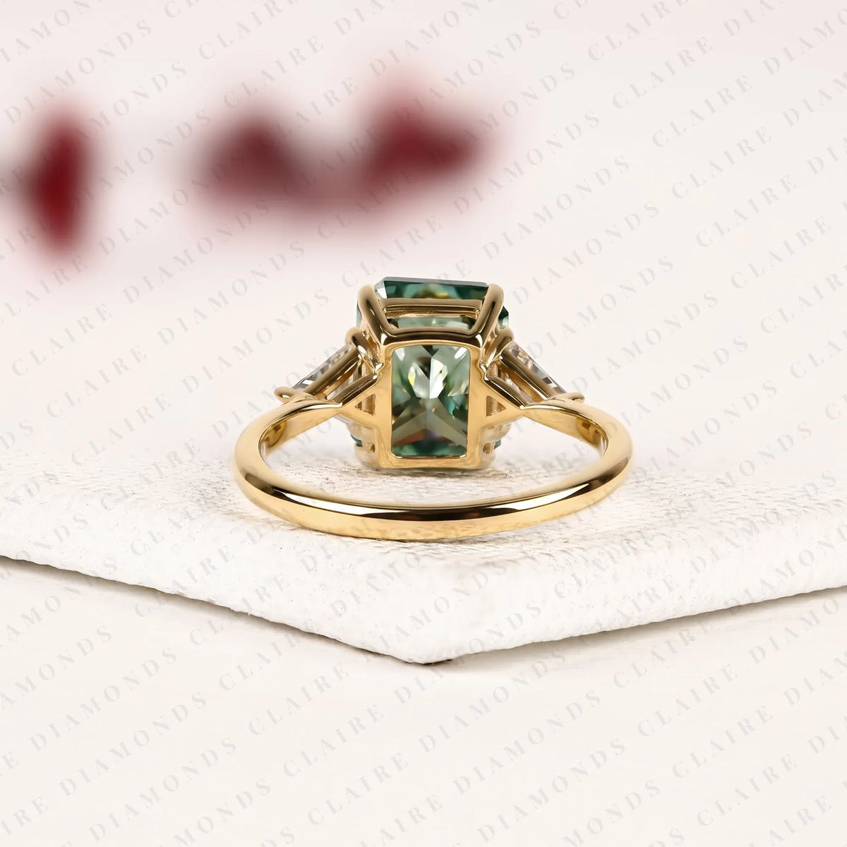 radiant cut green lab grown diamond engagement ring  three stone ring with trillion diamond accents luxury bridal jewelry