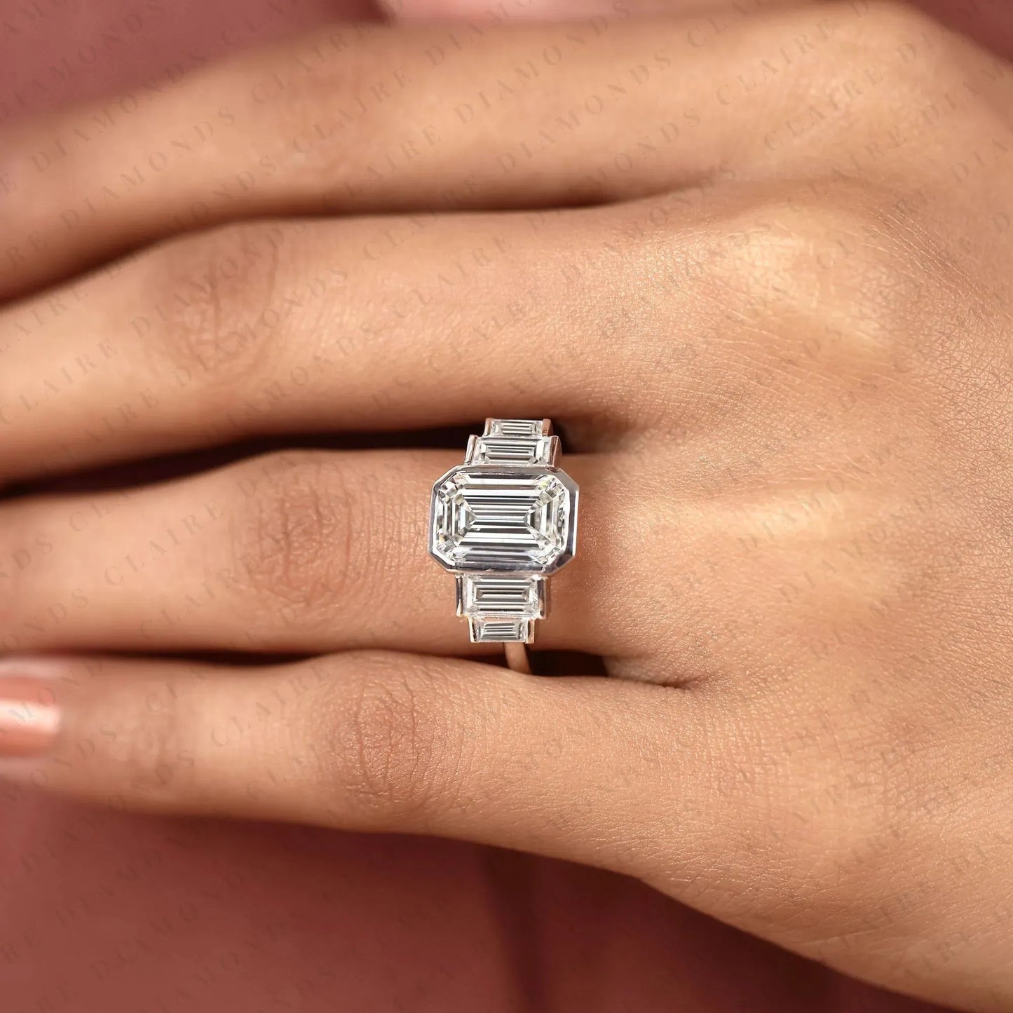 emerald cut three stone lab grown diamond engagement ring bezel set emerald diamond ring with tapered baguette side stones luxury bridal ring