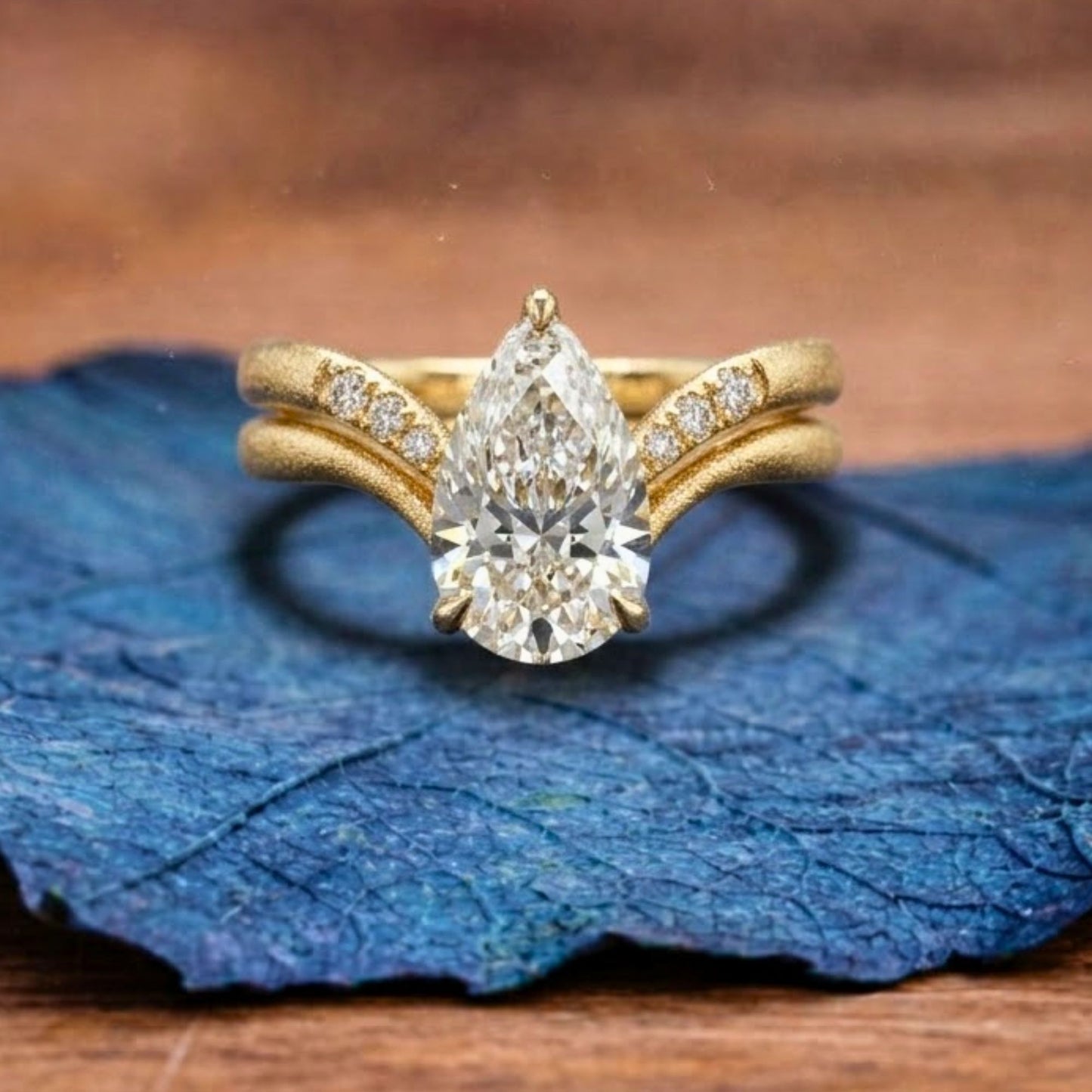 pear cut moissanite engagement ring set curve band gold bridal set