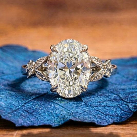 Oval Moissanite Diamond Engagement Ring with Floral Leaf Art Deco Setting in White Gold