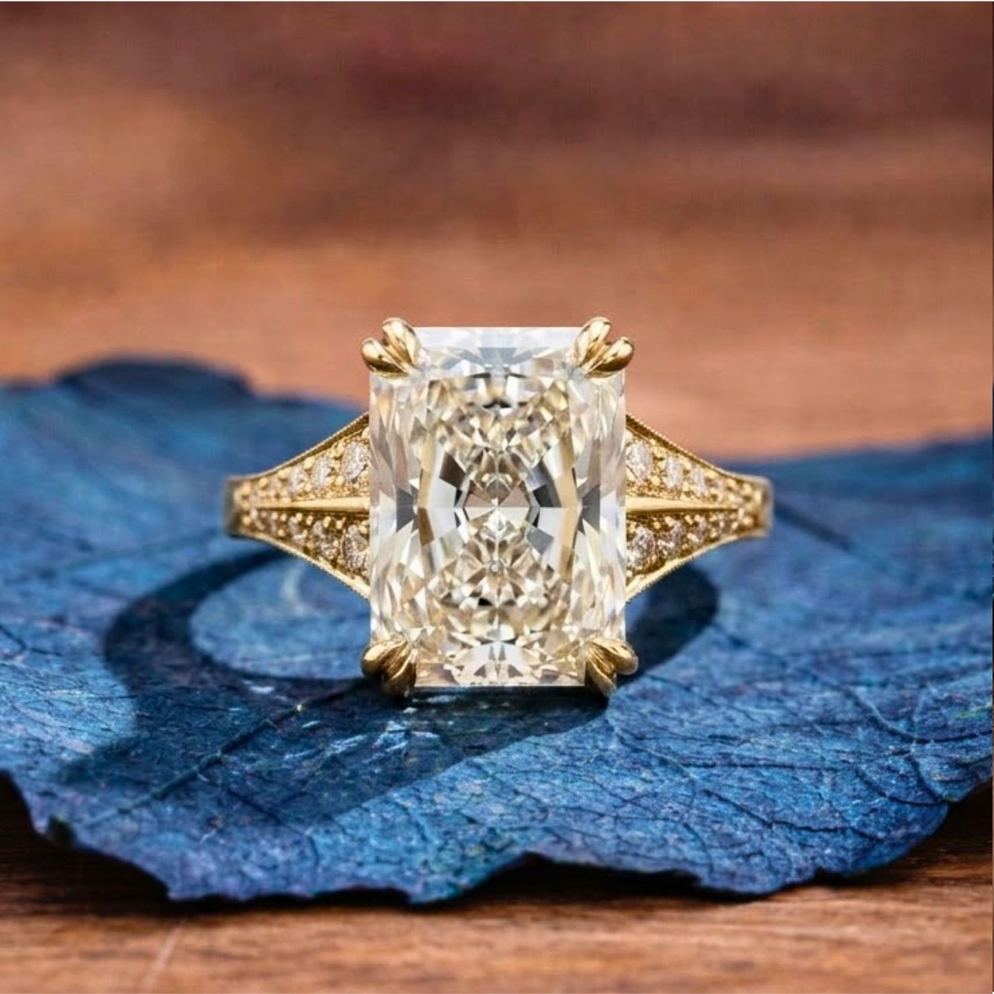 radiant cut lab grown diamond engagement ring with split shank art deco setting in yellow gold
