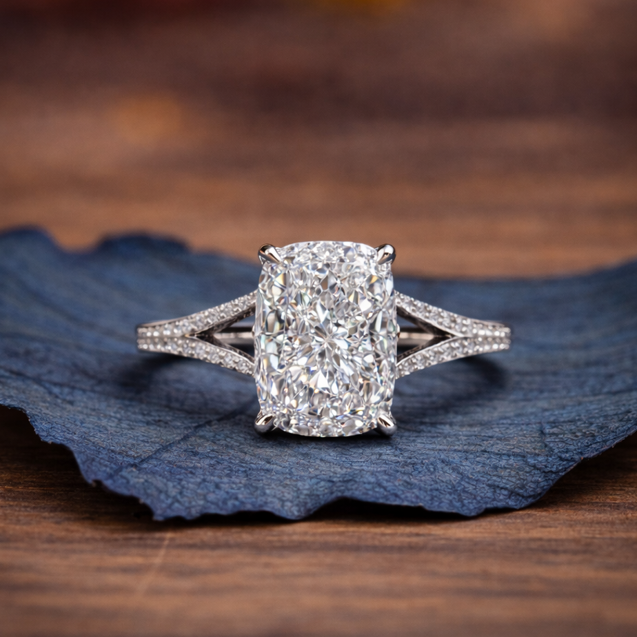 Diamond ring on a blue leaf with a blurred 
