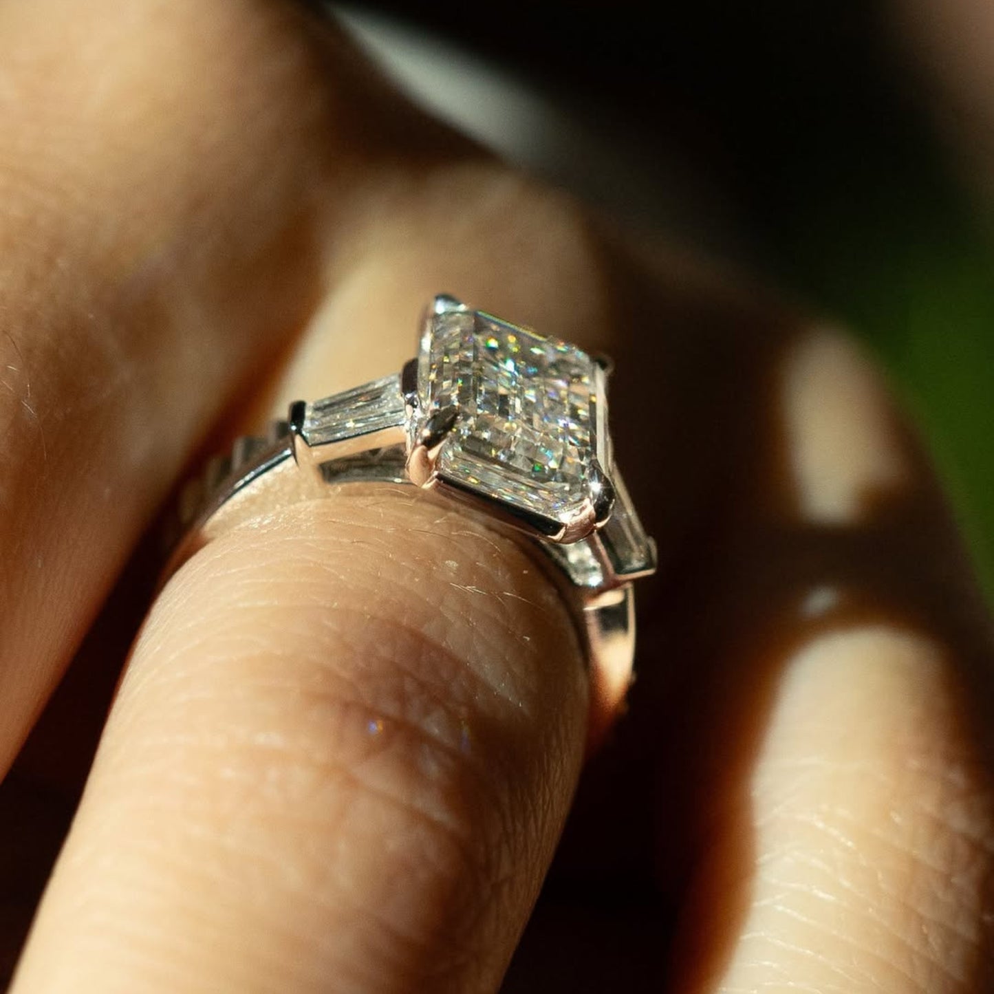 emerald three stone moissanite engagement ring past present future wedding ring