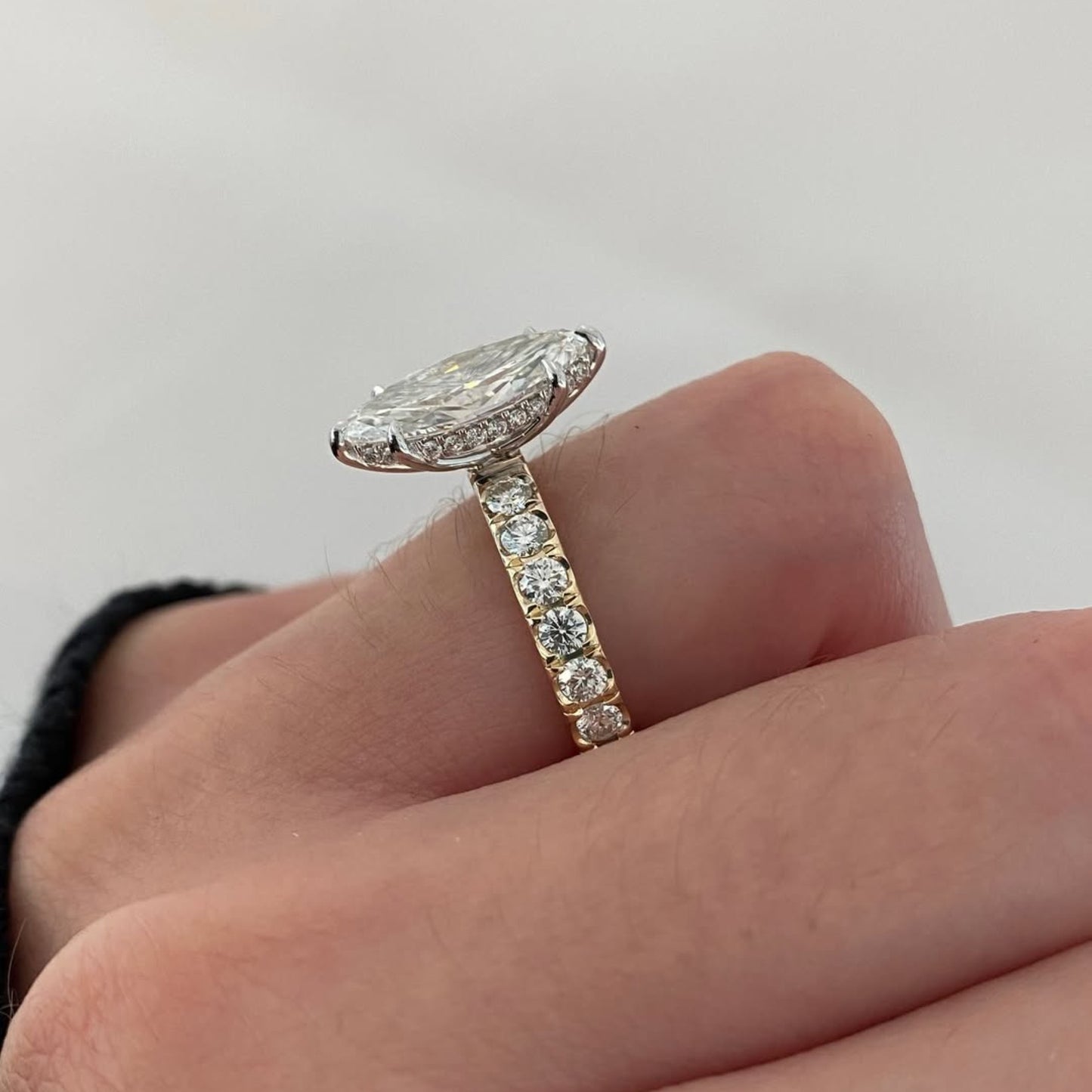 marquise  lab grown diamond engagement ring yellow gold band with side diamonds vintage milgrain setting