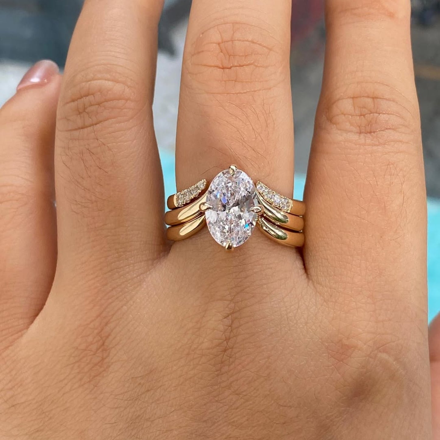 oval lab grown diamond ring set with curved pavé gold bands, luxury bridal engagement & wedding ring set, modern statement oval cut design