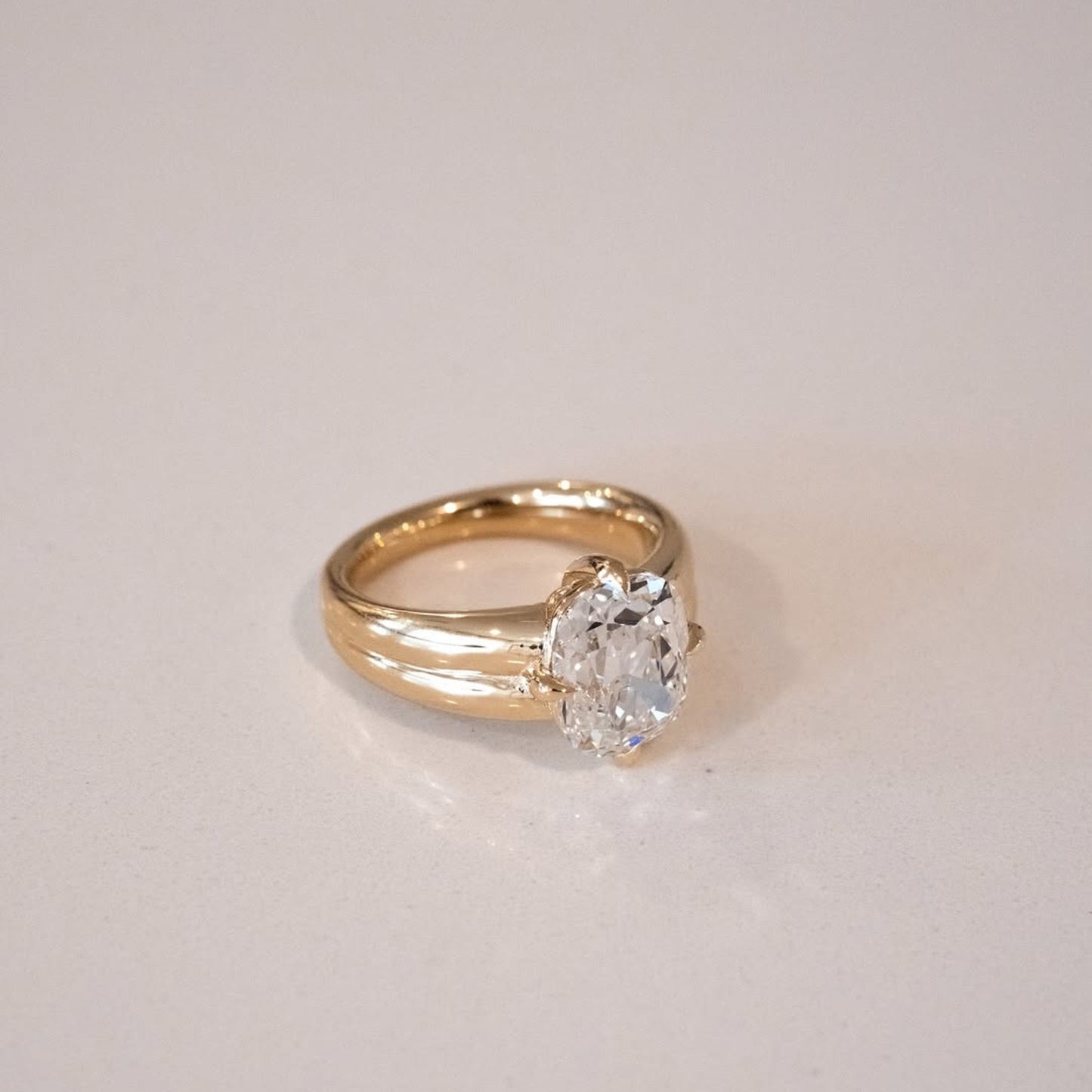old mine lab grown elongated cushion cut engagement ring in yellow gold, vintage-inspired solitaire diamond ring