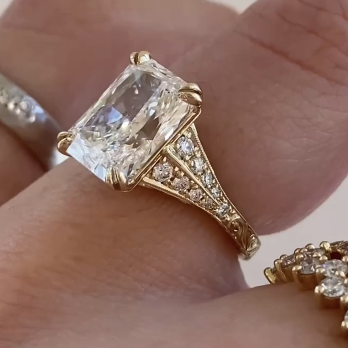 radiant cut lab grown diamond engagement ring with split shank art deco setting in yellow gold