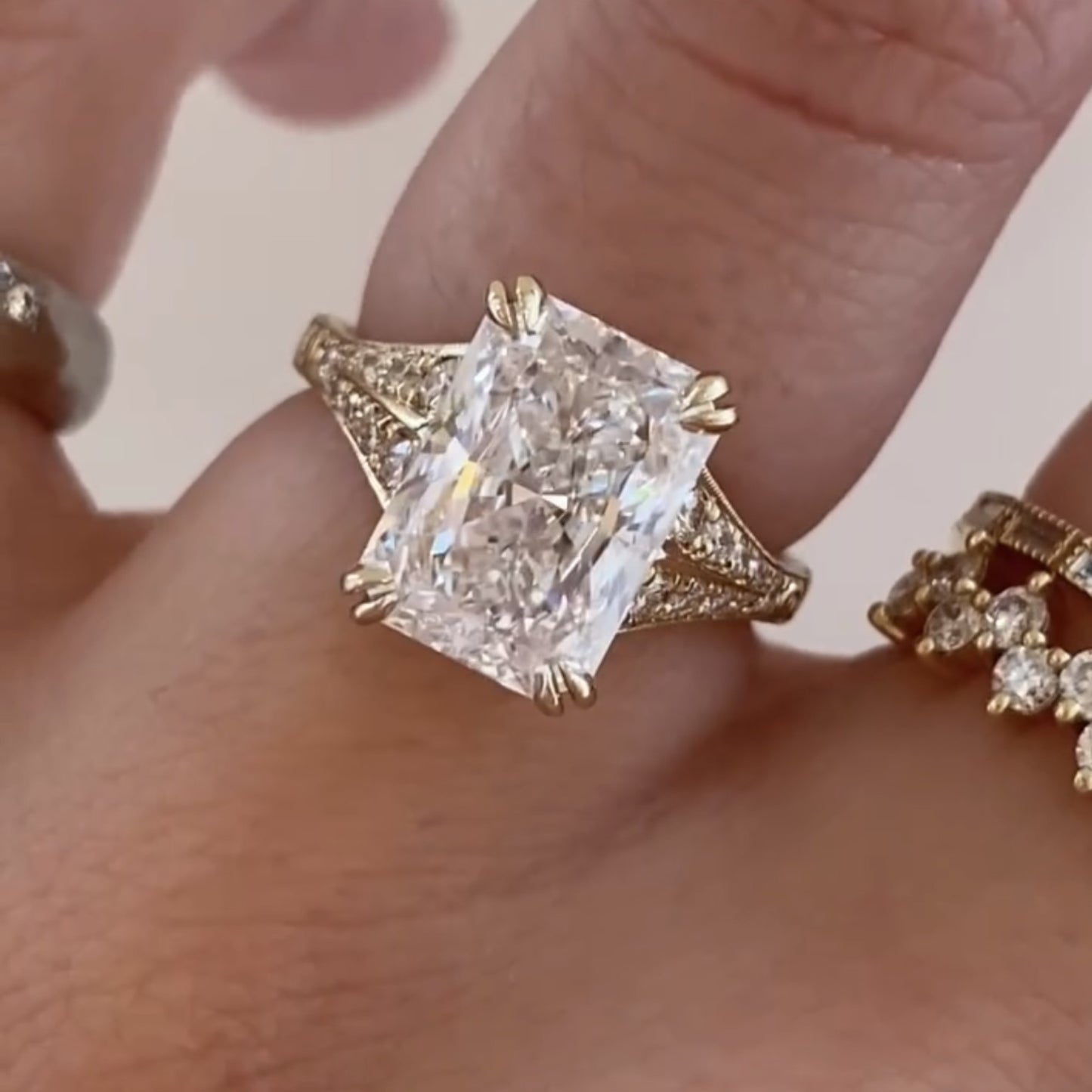 radiant cut lab grown diamond engagement ring with split shank art deco setting in yellow gold