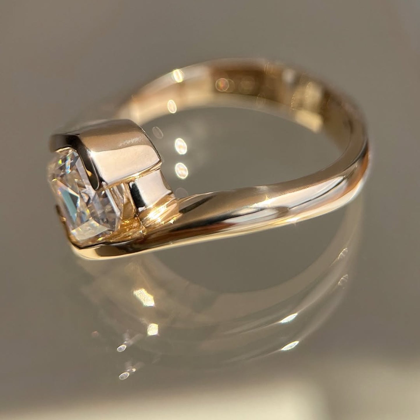 asscher cut lab grown engagement ring half bezel east west wedding ring
