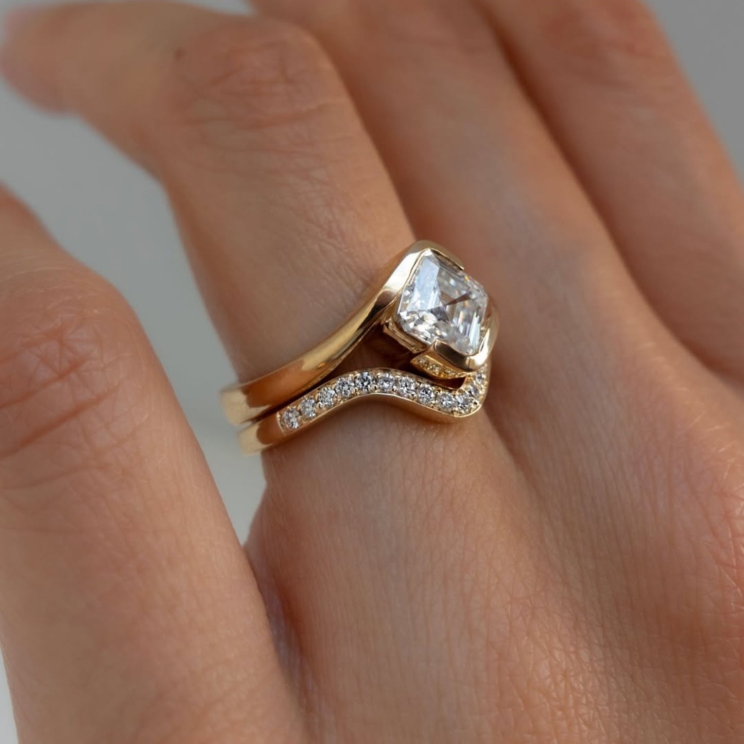 asscher lab grown engagement ring set east west half bezel wedding bridal set