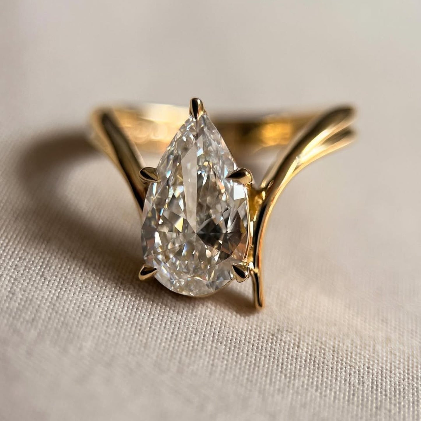 pear cut lab grown engagement ring bypass gold wedding ring