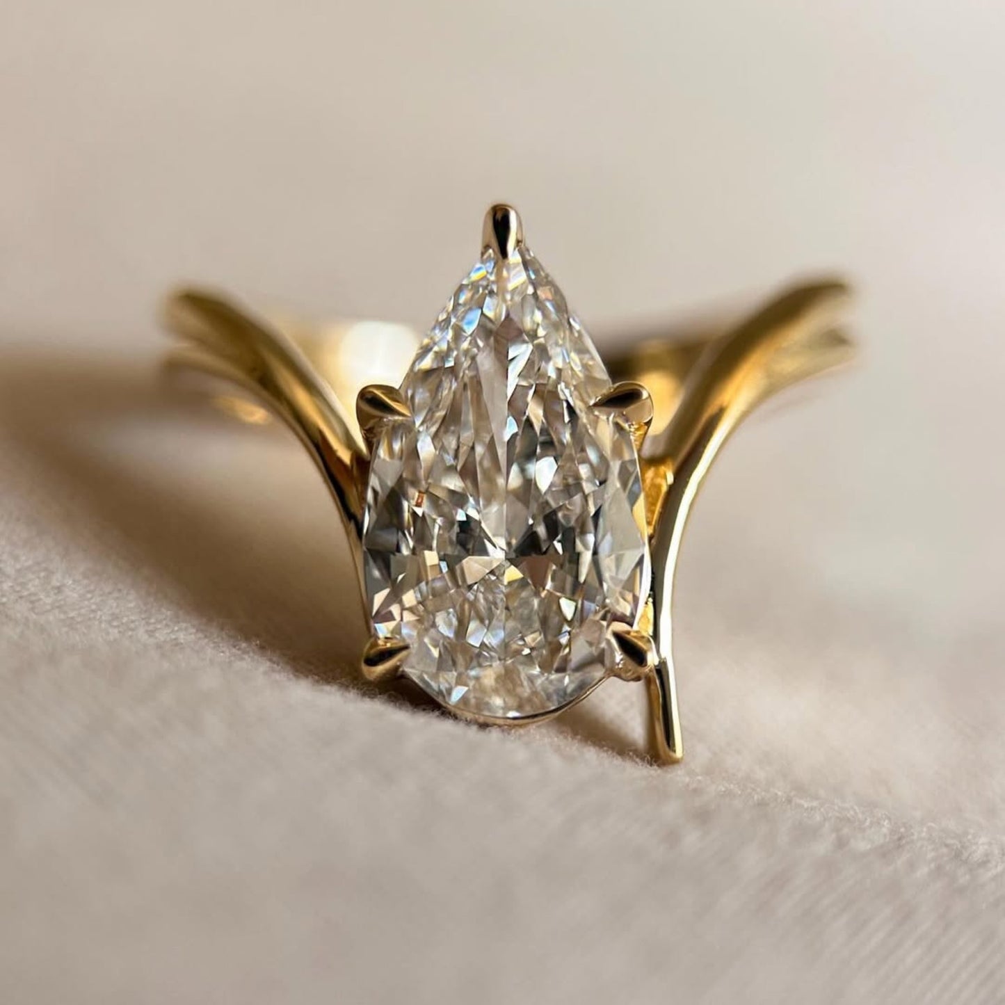 pear cut lab grown engagement ring bypass gold wedding ring