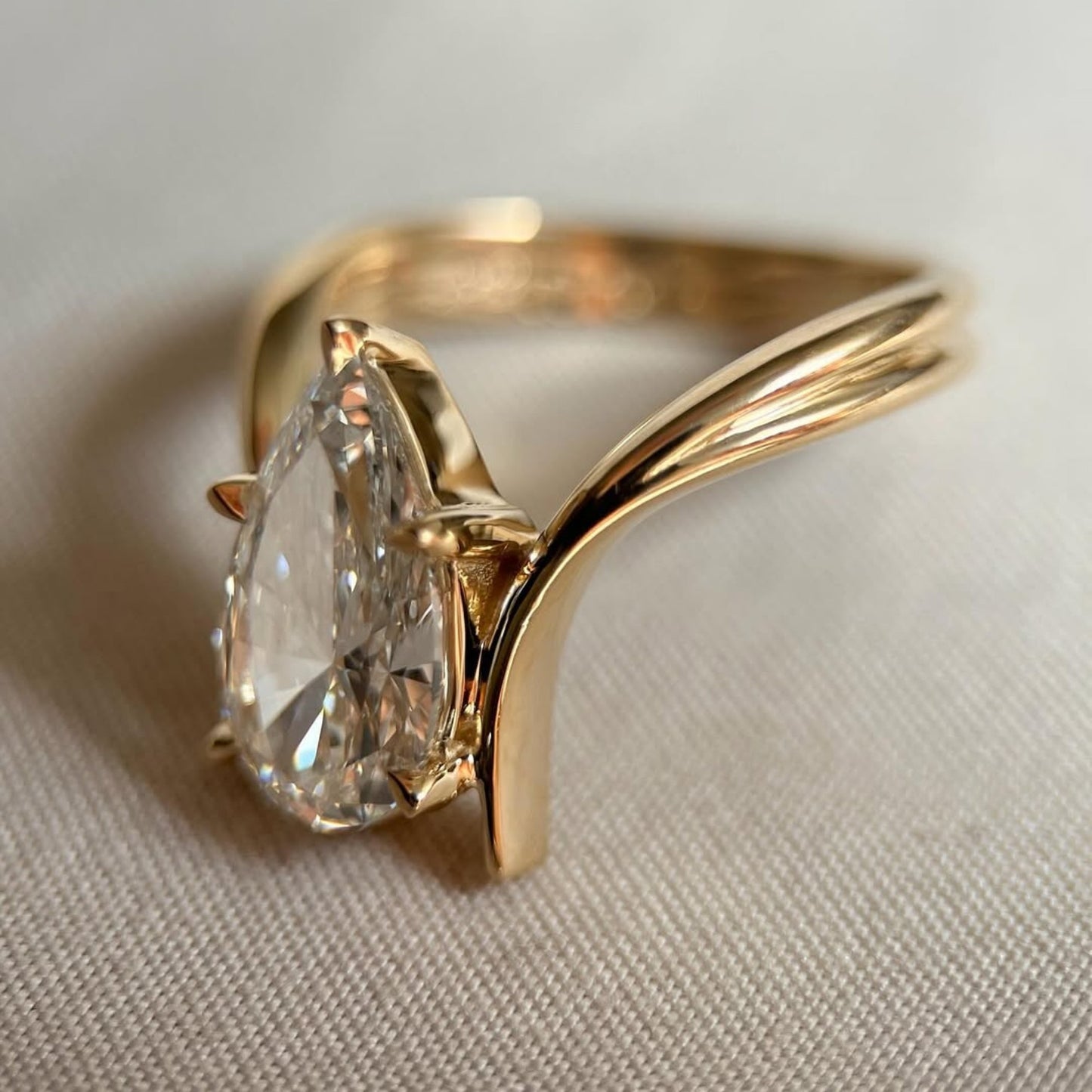 pear cut lab grown engagement ring bypass gold wedding ring
