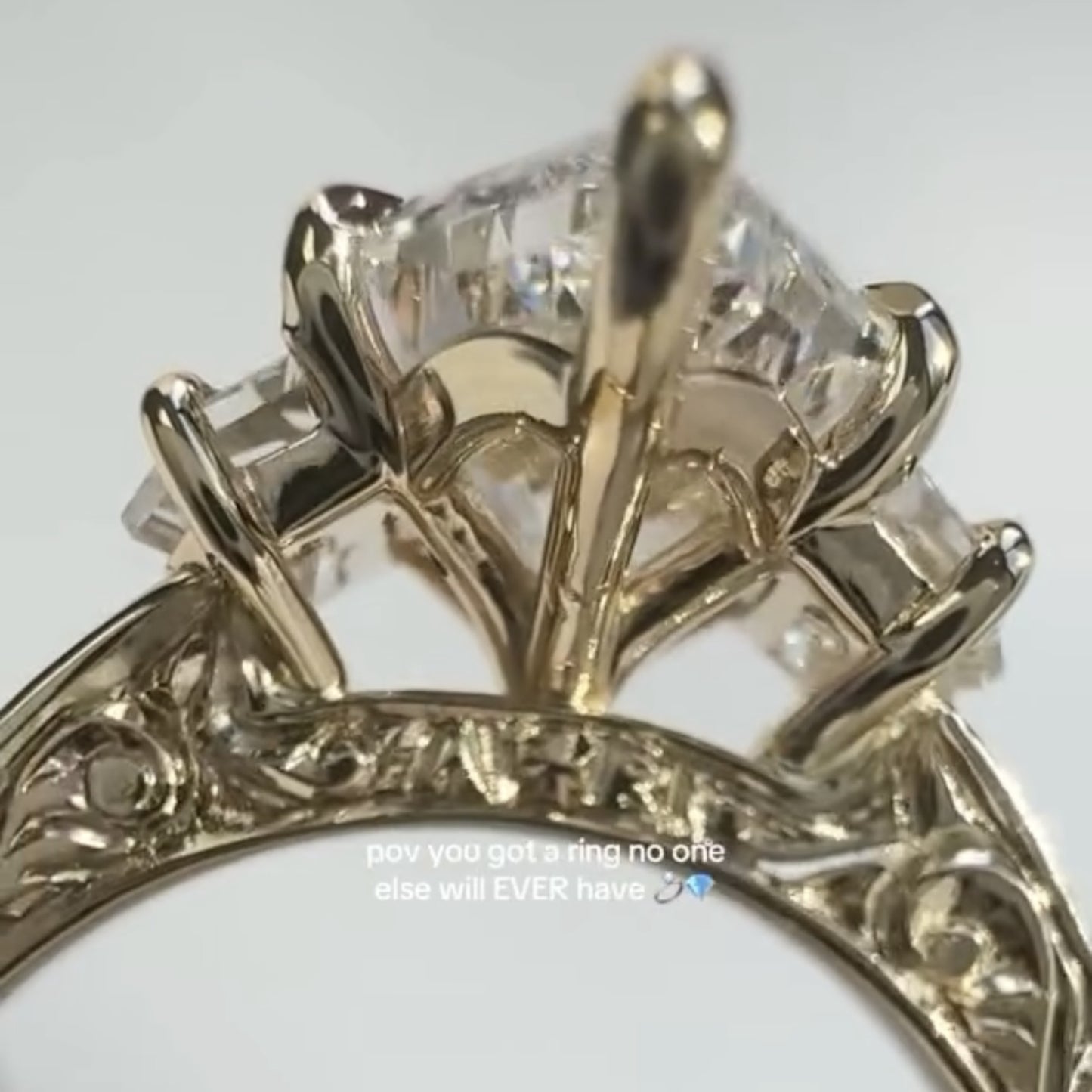 dutch marquise three stone moissanite engagement ring