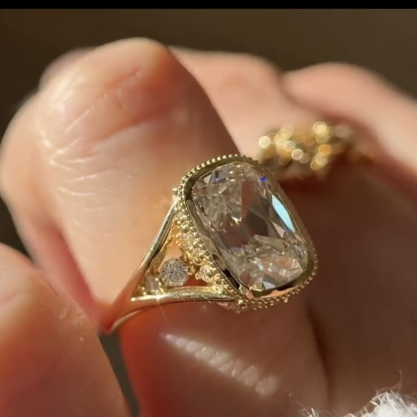 old mine elongated cushion moissanite engagement ring bezel set vintage inspired ring