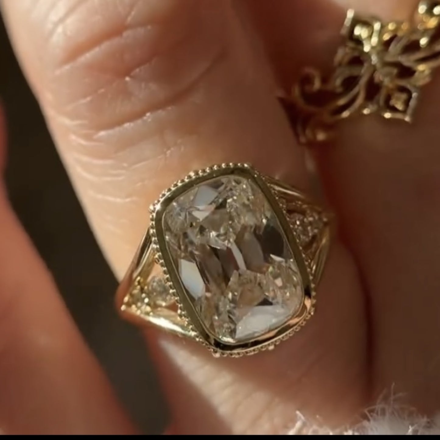 old mine elongated cushion moissanite engagement ring bezel set vintage inspired ring