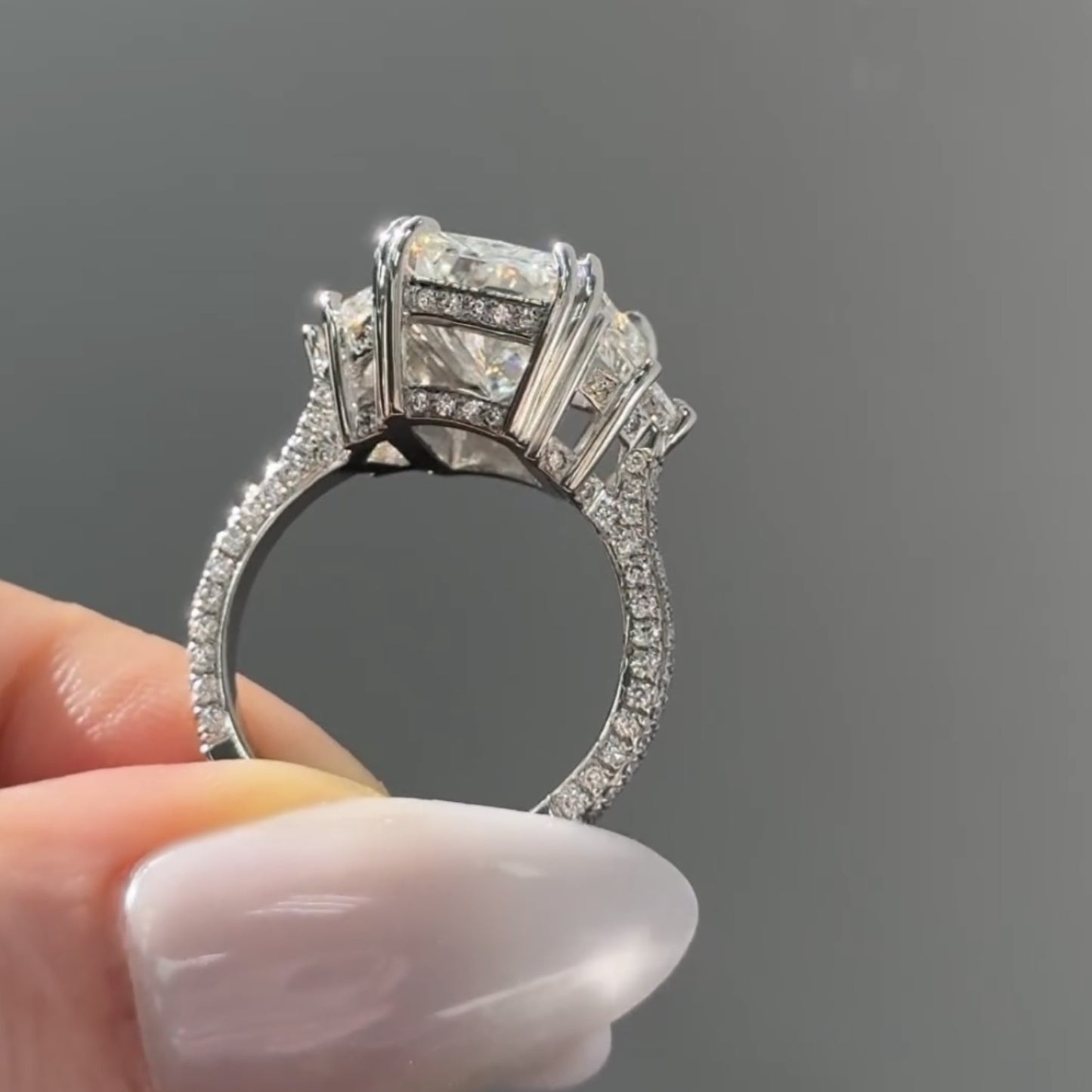 radiant three stone moissanite engagement ring past preset future wedding ring