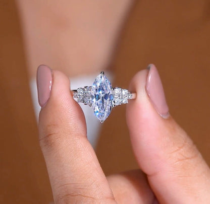 Timeless Marquise Lab Grown Diamond Ring with Delicate Sparkling Side Stone Detailing and Elegant Engagement Ring
