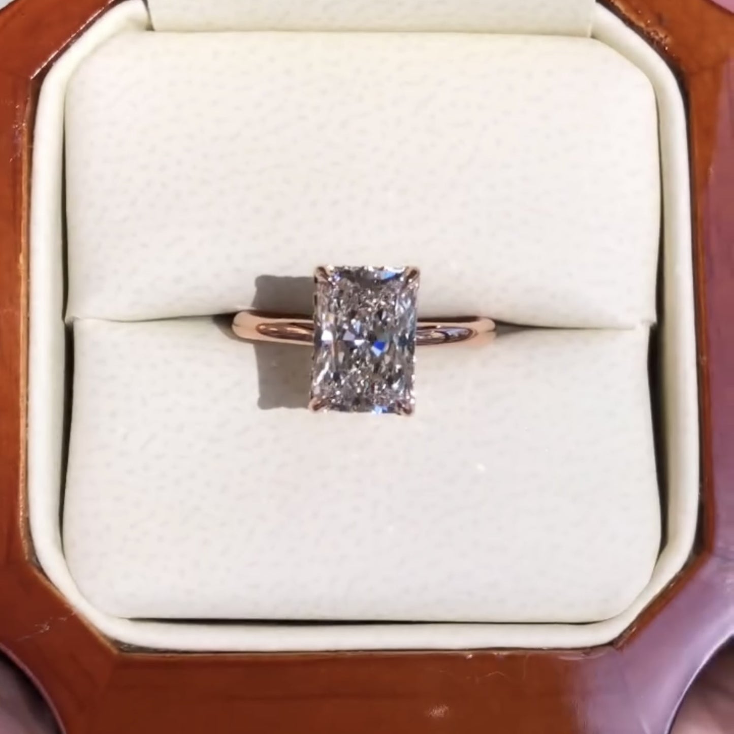 radiant cut moissanite diamond solitaire engagement ring in rose gold